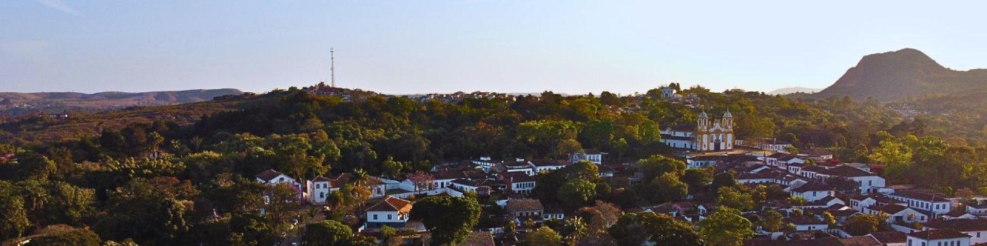 Banner principal do site: Tiradentes: O Charme Colonial e a Riqueza da Culinária Mineira