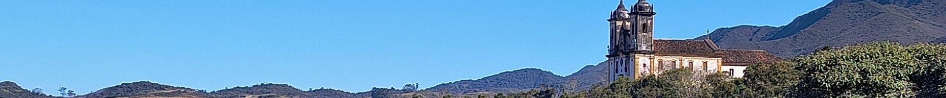 Banner principal do site: Minas Gerais: Terra de Montanhas, Cachoeiras, Cidades Históricas, Gastronomia Única e a Estrada Real